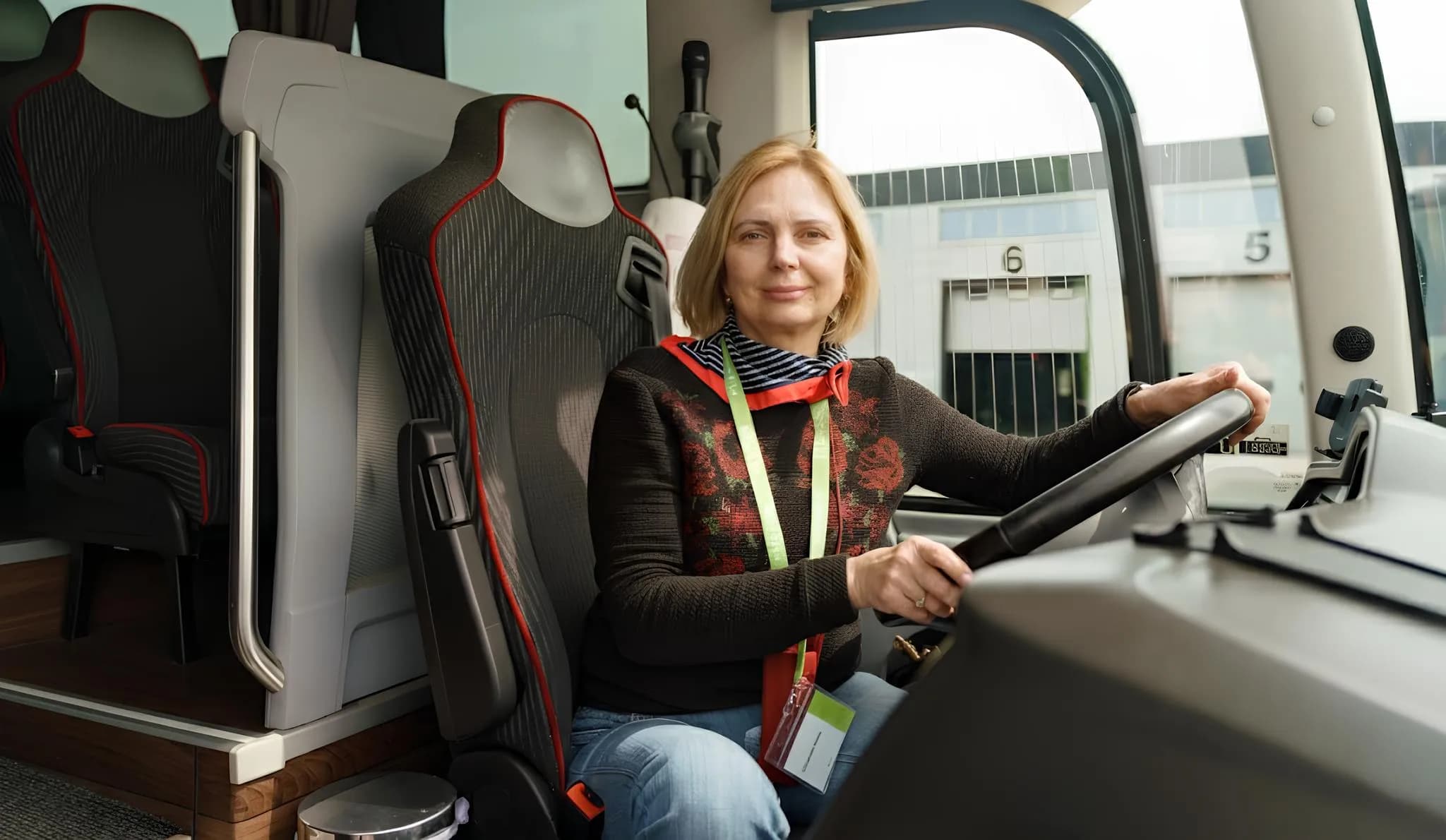 A woman rides a bus